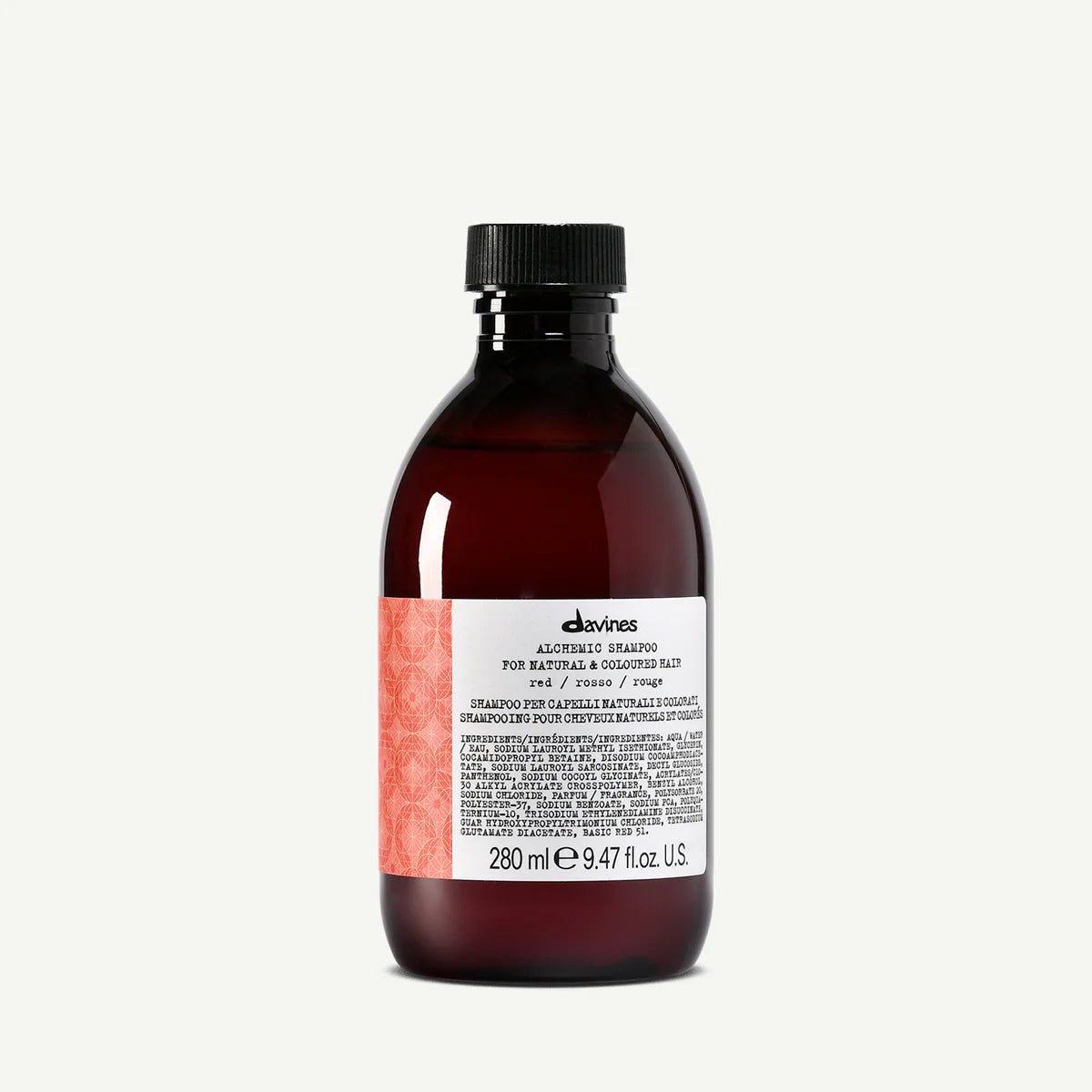 Alchemic Shampoo Red i en mörkröd flaska med svart lock, miljövänligt schampo för färgat hår från Davines.