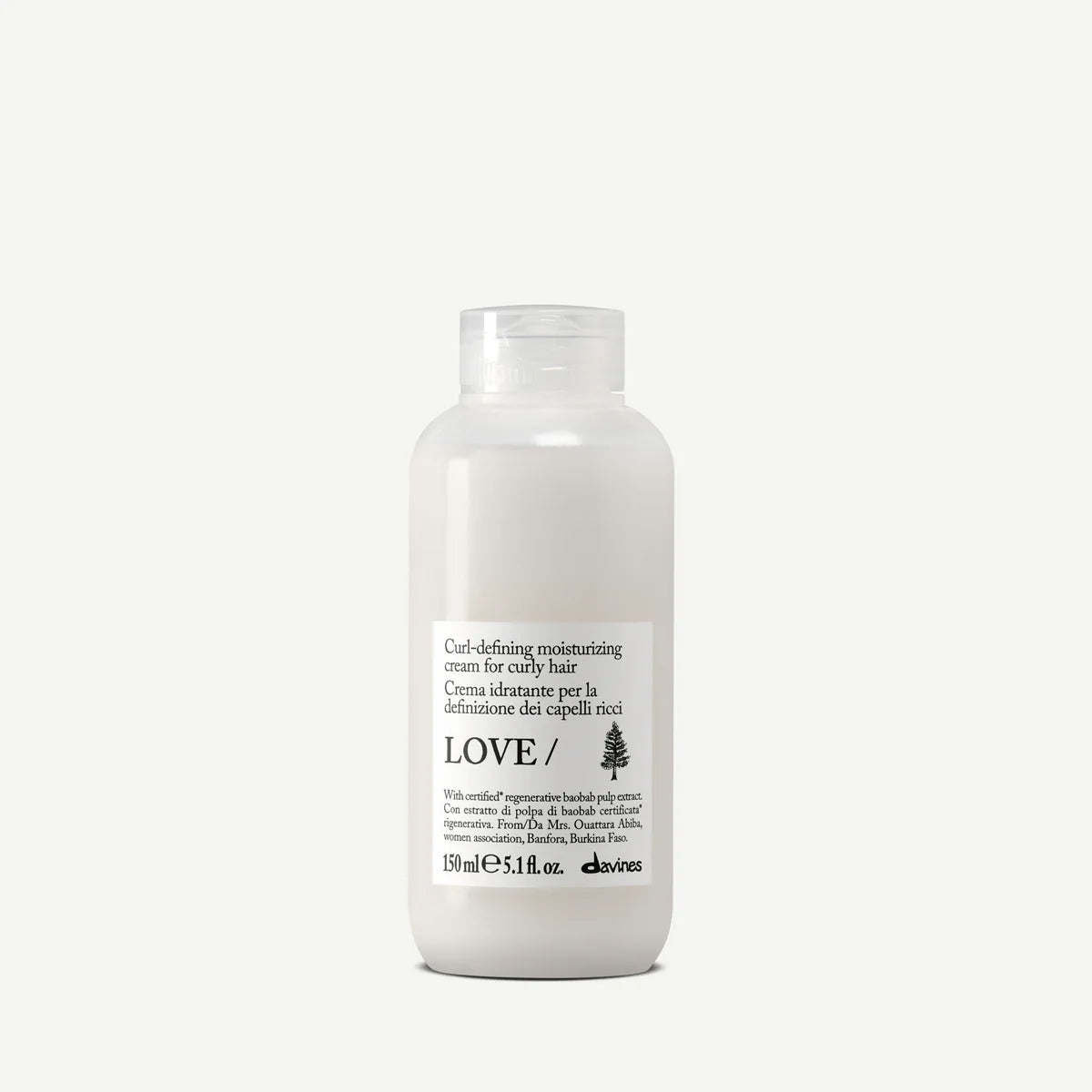 Flaska med Love Curl Defining Moisturizing Cream för styling och återfuktning av lockigt hår, en miljövänlig hårvårdsprodukt i enkel vit förpackning.