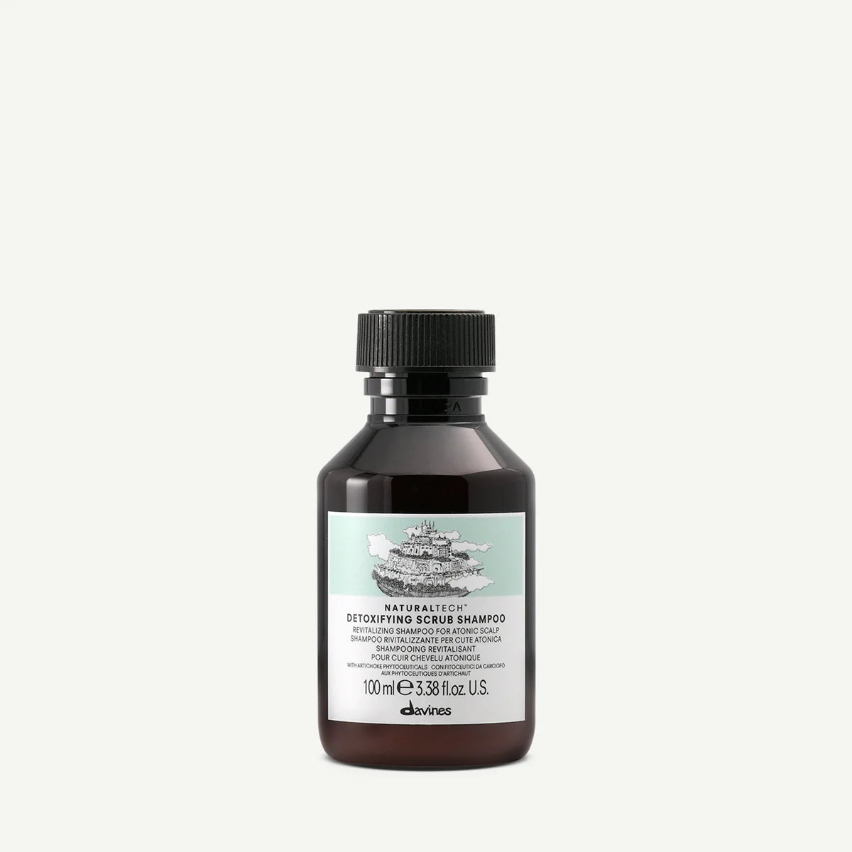 Brown flaska med svart lock innehållande Naturaltech Detoxifying Scrub Shampoo i 100 ml, en miljövänlig scrub och schampo för hårvård från Davines.