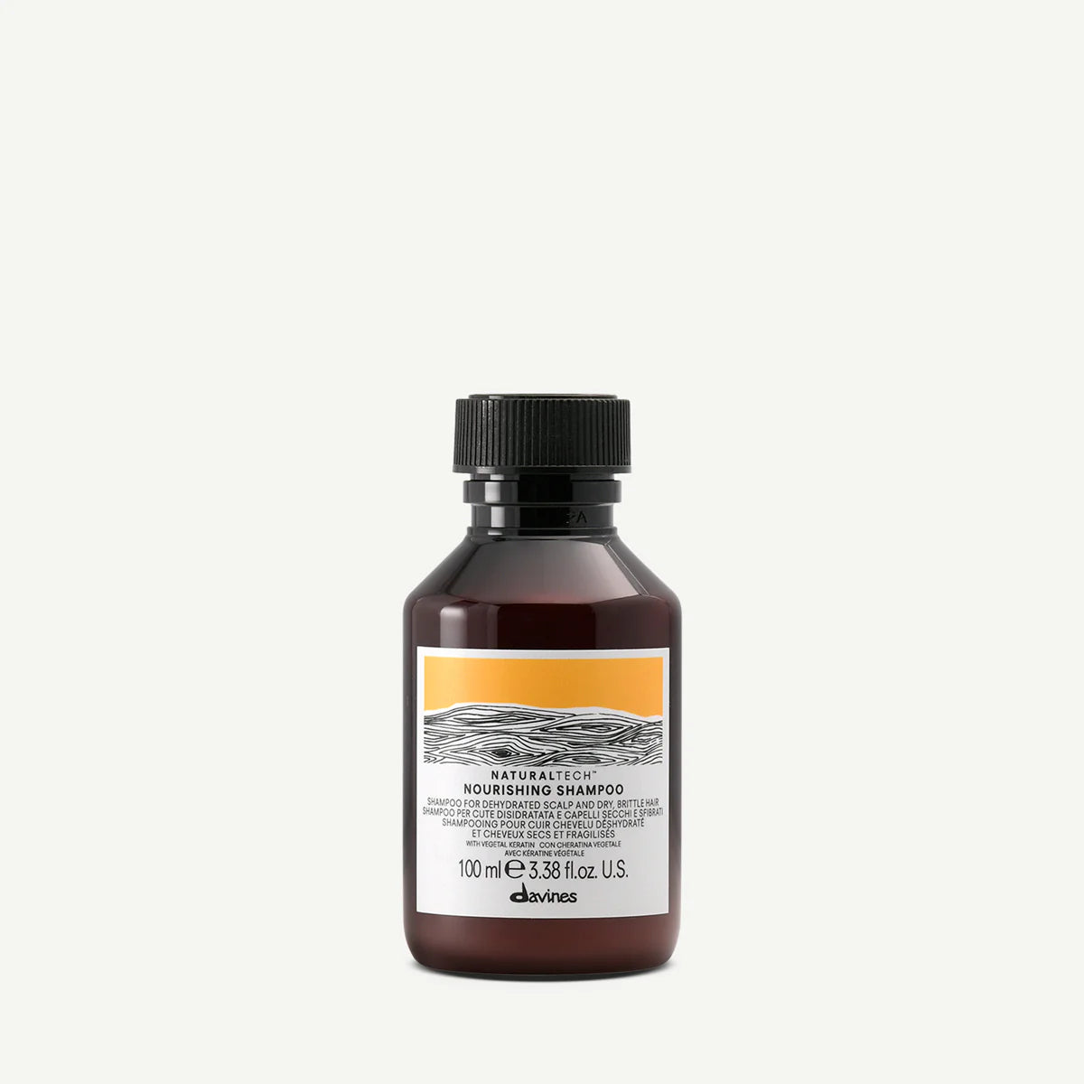 Naturaltech Nourishing Shampoo i en brun flaska med svart skruvkork, en mild och vårdande schampo för torrt och känsligt hår från Davines.