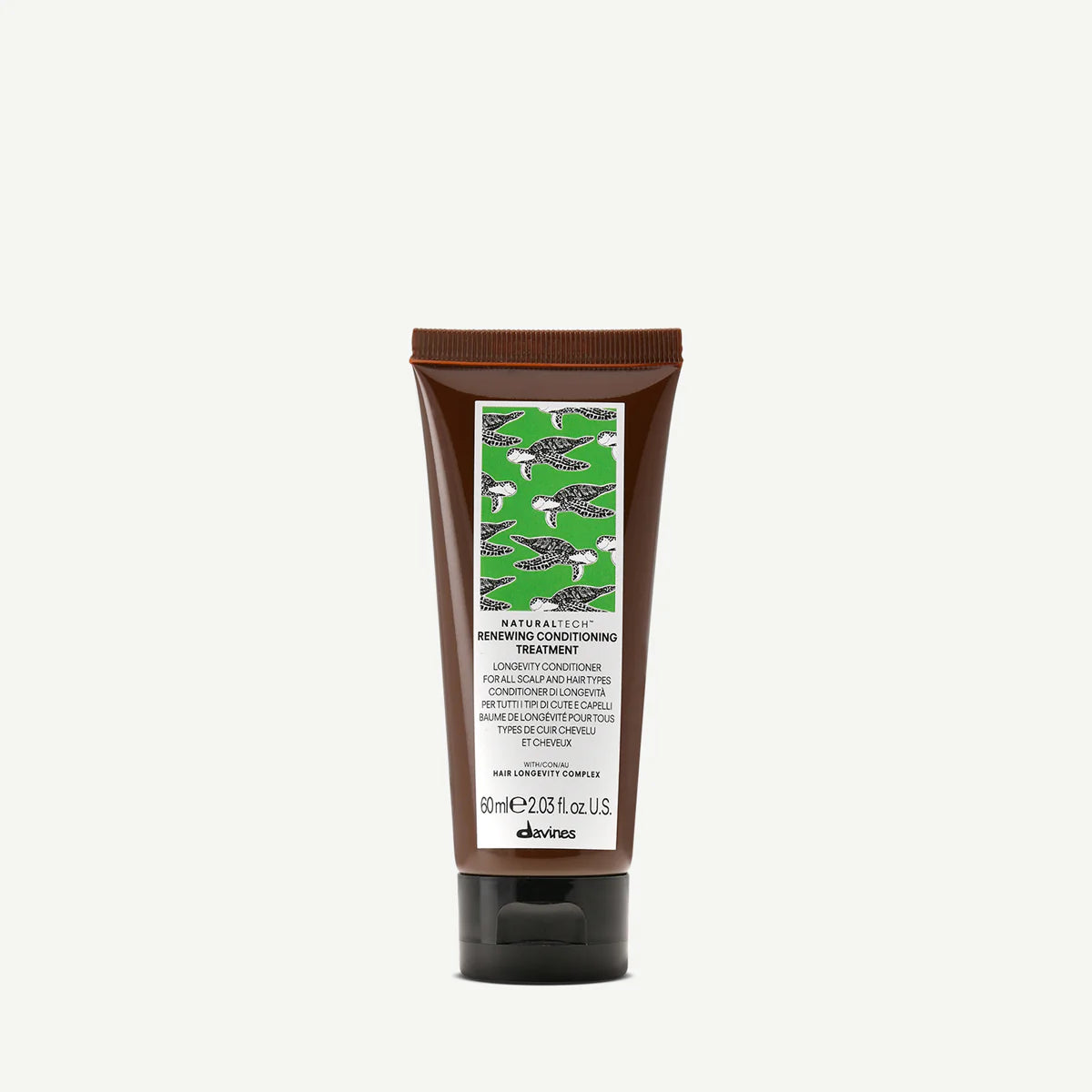 Naturaltech Renewing Conditioning Treatment i en brun tub med grönt fågelmönster, en miljövänlig hårinpackning som ger näring och återfuktar håret.