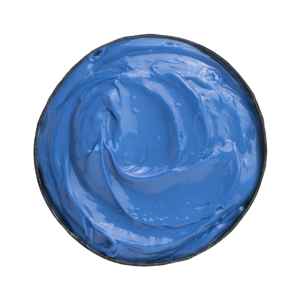 Alchemic Creative Conditioner Teal i en krämig, blå nyans som används som balsam för att vårda och återfukta håret.